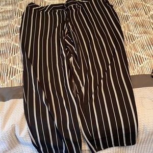 Beautiful new with tags black with white striped pants. Tapered ankles